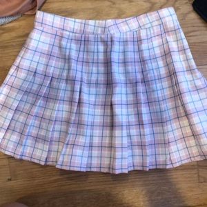 pink pleated mini skirt